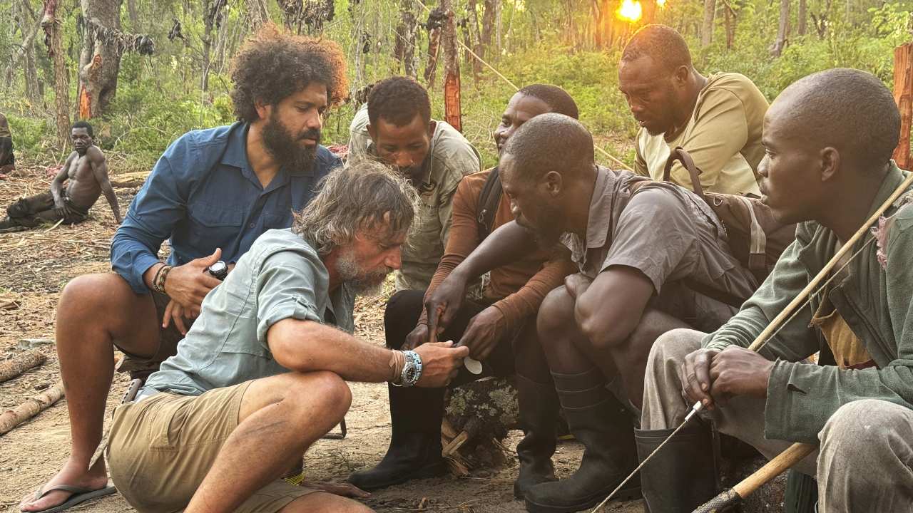 a group of men sitting together